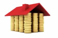 Monedas en forma de casa con tejado